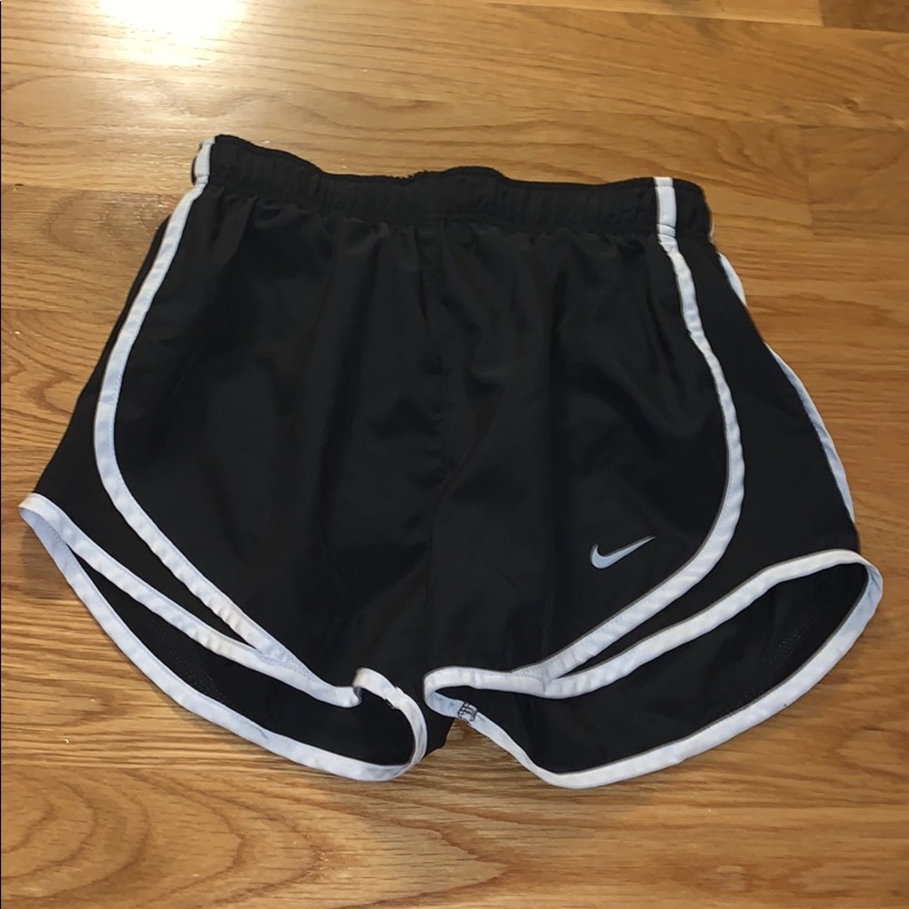 Black Nike running shorts